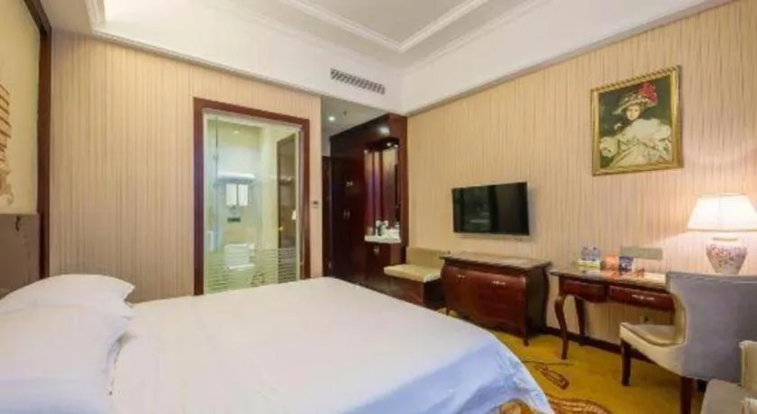 Bed in Vienna Hotel Jiangxi Ji'an Anfu