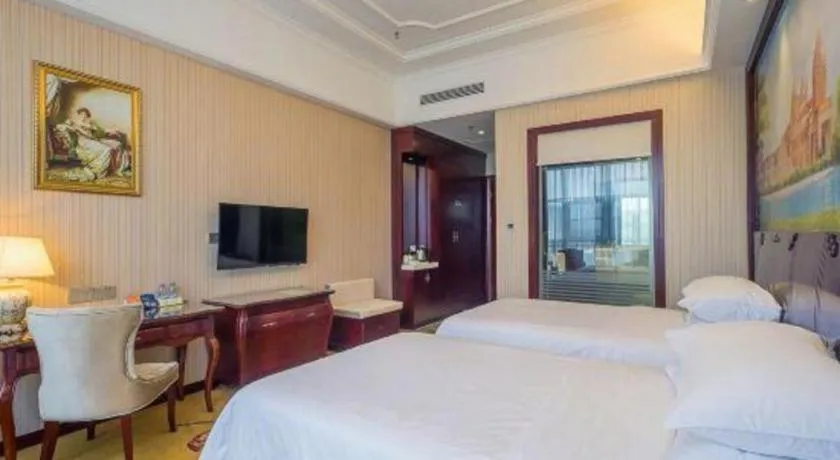 Bed in Vienna Hotel Jiangxi Ji'an Anfu