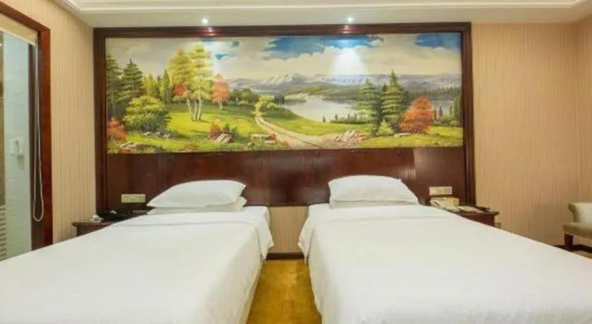 Bed in Vienna Hotel Jiangxi Ji'an Anfu