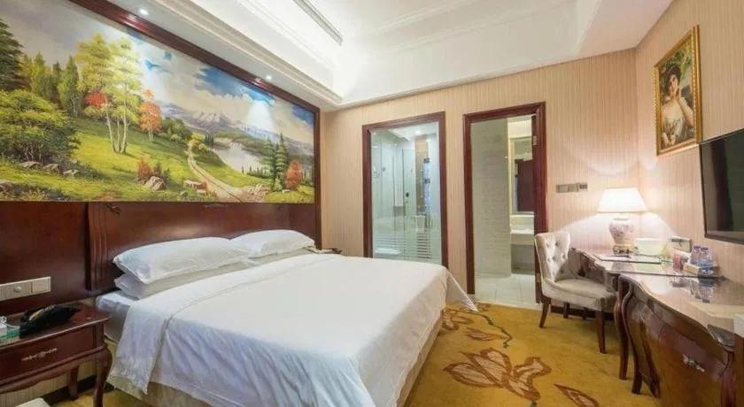 Bed in Vienna Hotel Jiangxi Ji'an Anfu