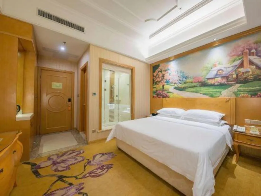 Bed in Vienna Hotel Jiangxi Ji'an Anfu