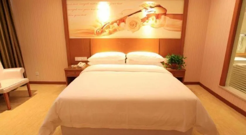 Bed in Vienna Hotel Jiangxi Ji'an Anfu