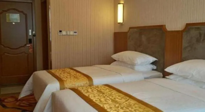 Bed in Vienna Hotel Jiangxi Ji'an Anfu
