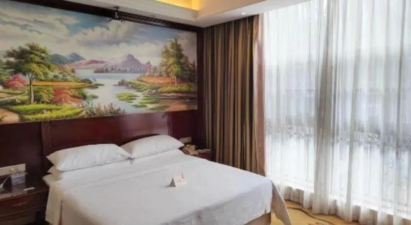 Bed in Vienna Hotel Jiangxi Ji'an Anfu