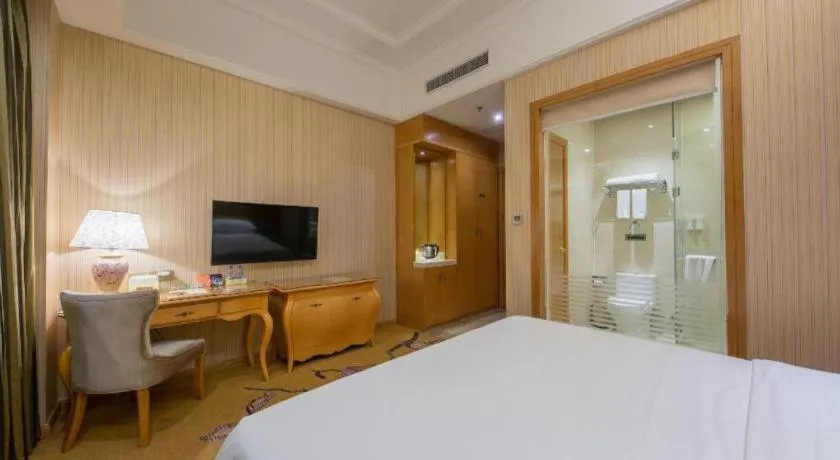 Bed in Vienna Hotel Jiangxi Ji'an Anfu