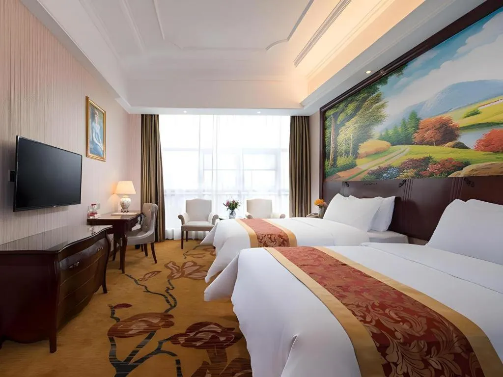 Bed in Vienna Hotel Jiangxi Ji'an Anfu