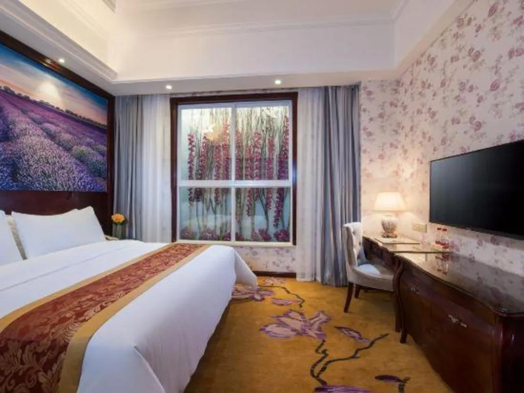 Bed in Vienna Hotel Jiangxi Ji'an Anfu