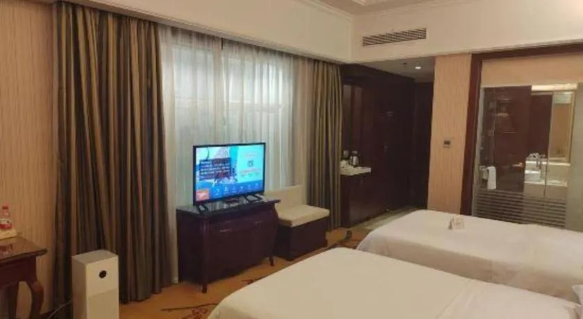 Bed in Vienna Hotel Jiangxi Ji'an Anfu