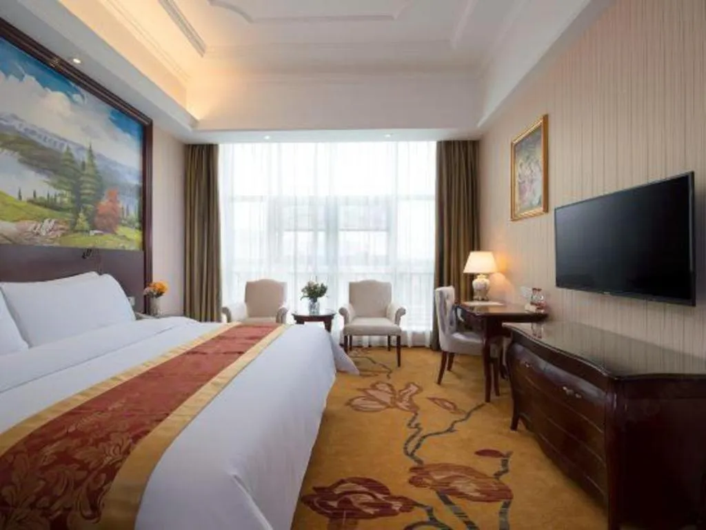 Bed in Vienna Hotel Jiangxi Ji'an Anfu