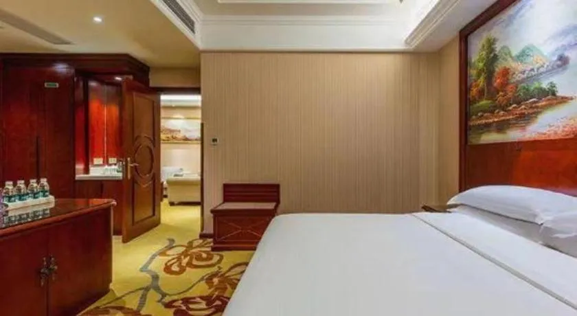 Bed in Vienna Hotel Jiangxi Ji'an Anfu