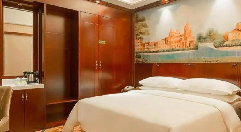 Bed in Vienna Hotel Jiangxi Ji'an Anfu