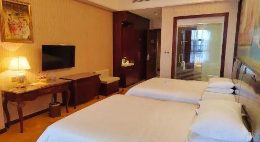 Bed in Vienna Hotel Jiangxi Ji'an Anfu