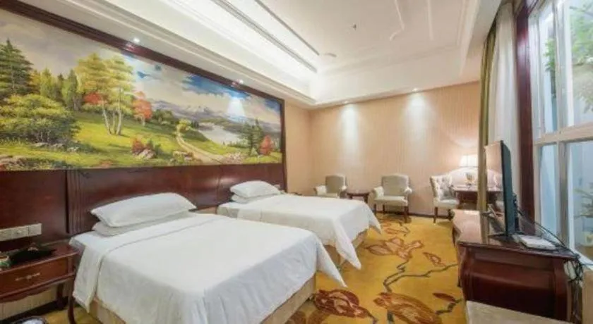 Bed in Vienna Hotel Jiangxi Ji'an Anfu