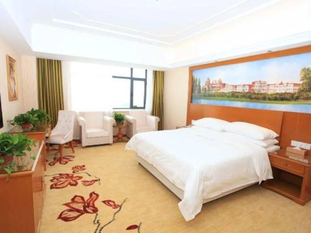 Bed in Vienna Hotel Jiangxi Ji'an Anfu