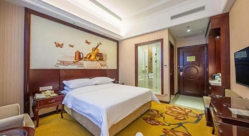 Bed in Vienna Hotel Jiangxi Ji'an Anfu