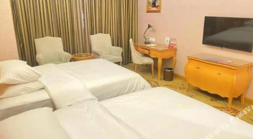 Bed in Vienna Hotel Guangdong Dongguan Chengnan Station