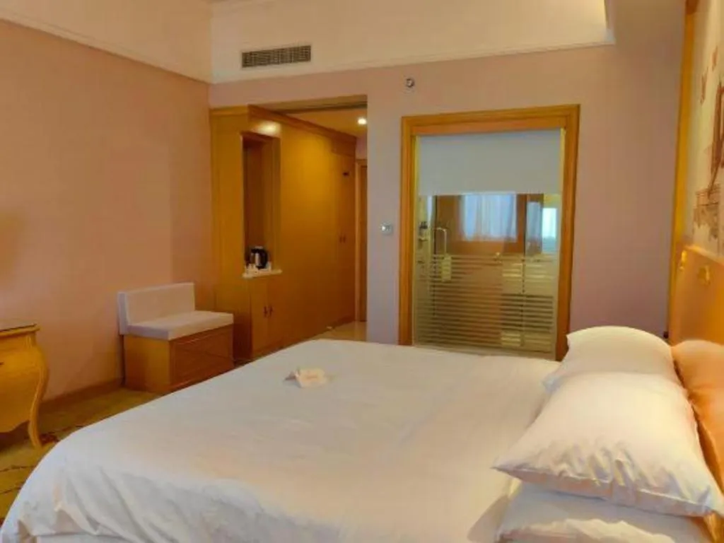 Bed in Vienna Hotel Guangdong Dongguan Chengnan Station