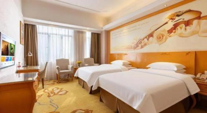 Bed in Vienna Hotel Guangdong Dongguan Chengnan Station