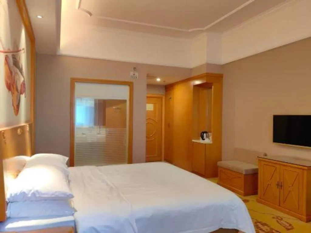 Bed in Vienna Hotel Guangdong Dongguan Chengnan Station