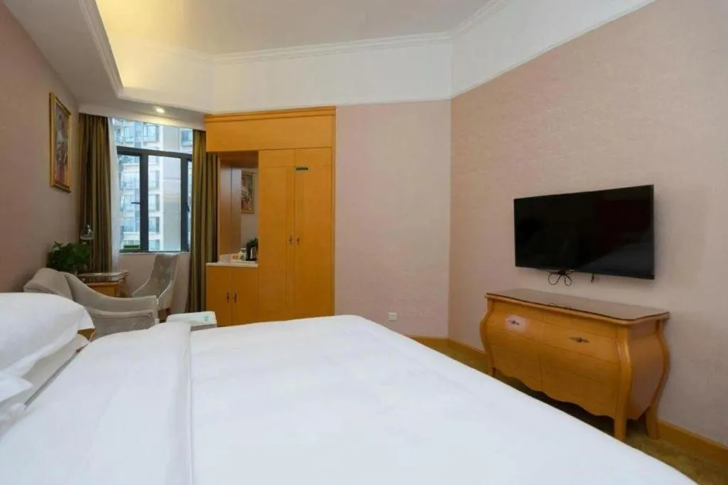 Bed in Vienna Hotel Guangdong Dongguan Chengnan Station