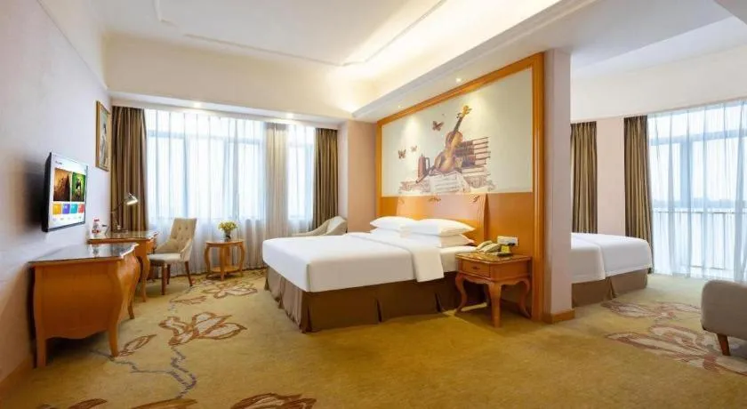 Bed in Vienna Hotel Guangdong Dongguan Chengnan Station