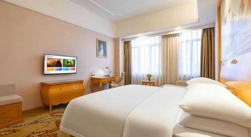 Bed in Vienna Hotel Guangdong Dongguan Chengnan Station