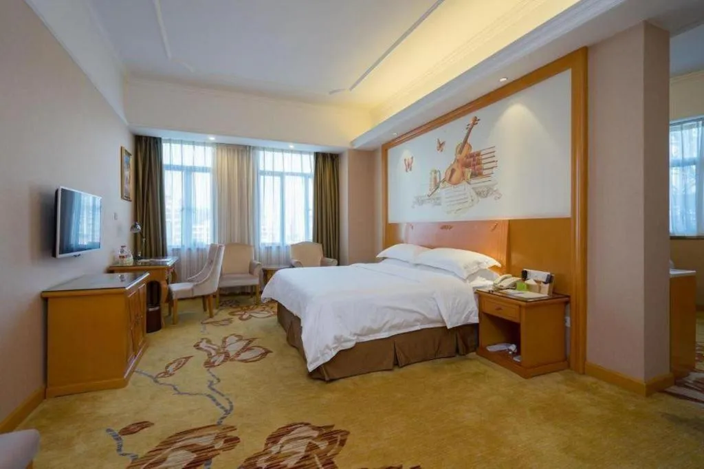 Bed in Vienna Hotel Guangdong Dongguan Chengnan Station