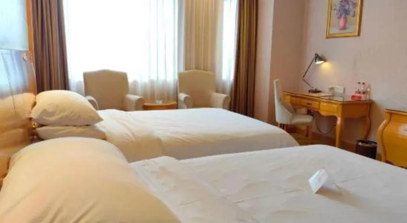 Bed in Vienna Hotel Guangdong Dongguan Chengnan Station