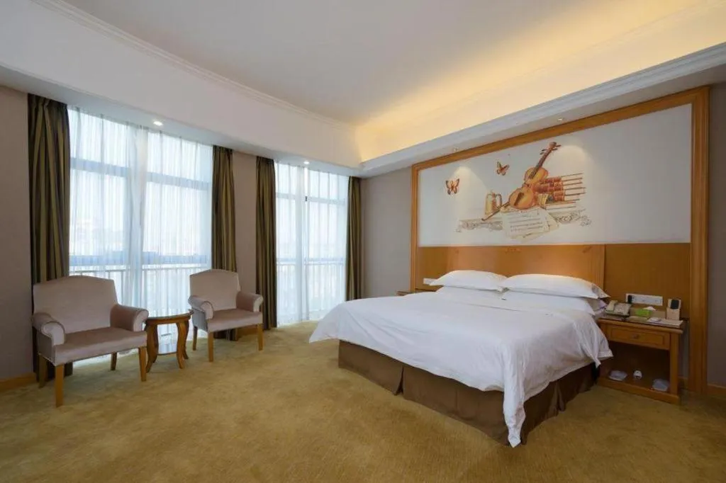 Bed in Vienna Hotel Guangdong Dongguan Chengnan Station
