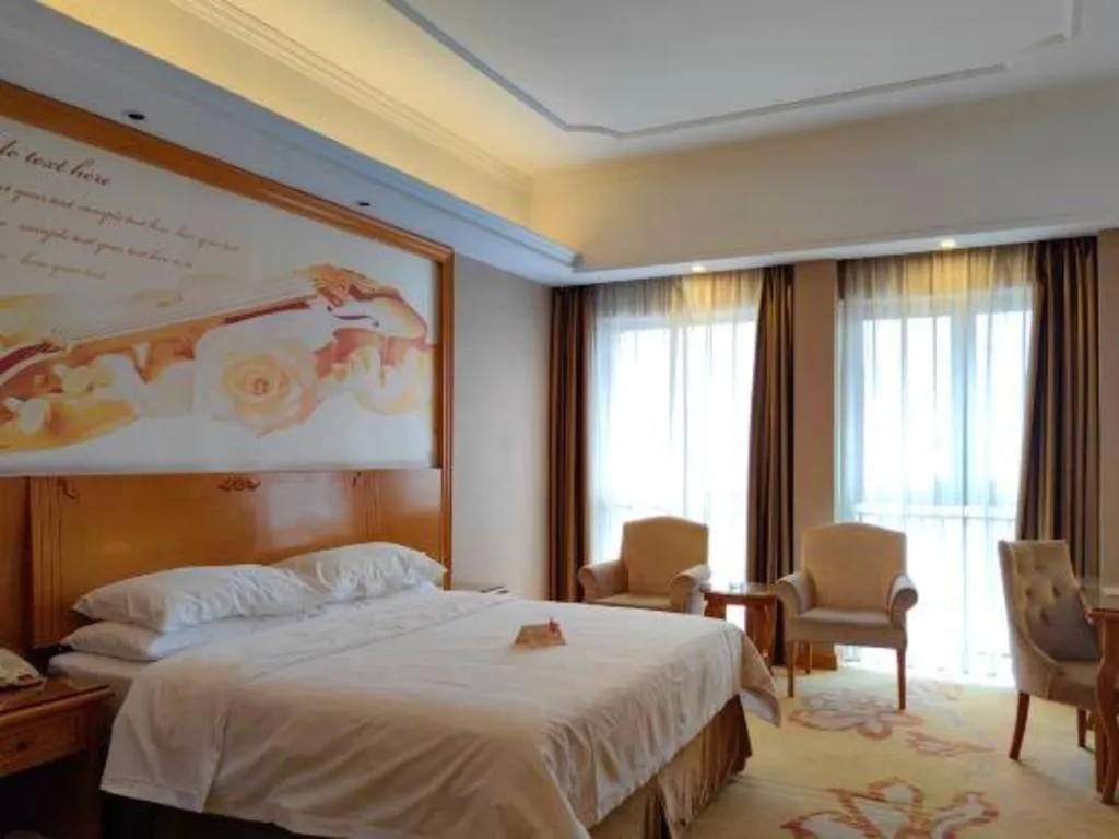 Bed in Vienna Hotel Guangdong Dongguan Chengnan Station