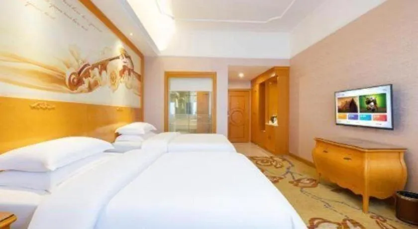 Bed in Vienna Hotel Guangdong Dongguan Chengnan Station