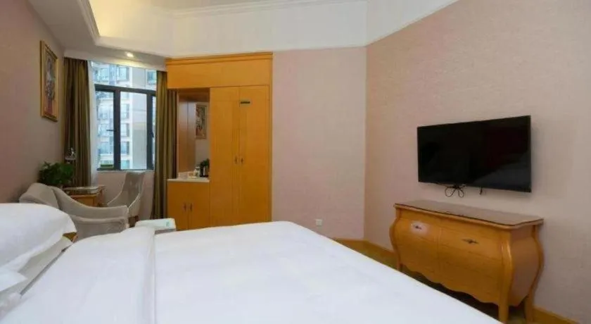 Bed in Vienna Hotel Guangdong Dongguan Chengnan Station