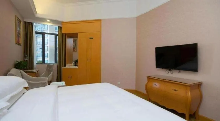 Bed in Vienna Hotel Guangdong Dongguan Chengnan Station