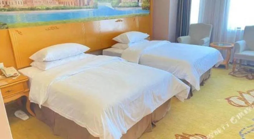 Bed in Vienna Hotel Guangdong Dongguan Chengnan Station
