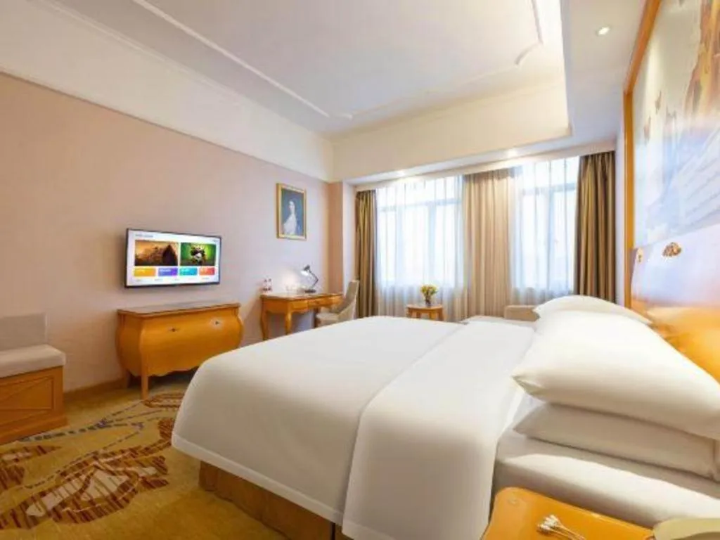 Bed in Vienna Hotel Guangdong Dongguan Chengnan Station