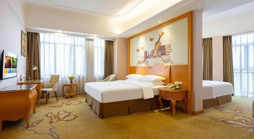 Bed in Vienna Hotel Guangdong Dongguan Chengnan Station