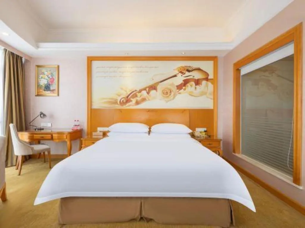 Bed in Vienna Hotel Guangdong Dongguan Chengnan Station