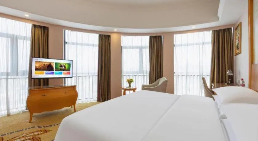 Bed in Vienna Hotel Guangdong Dongguan Chengnan Station