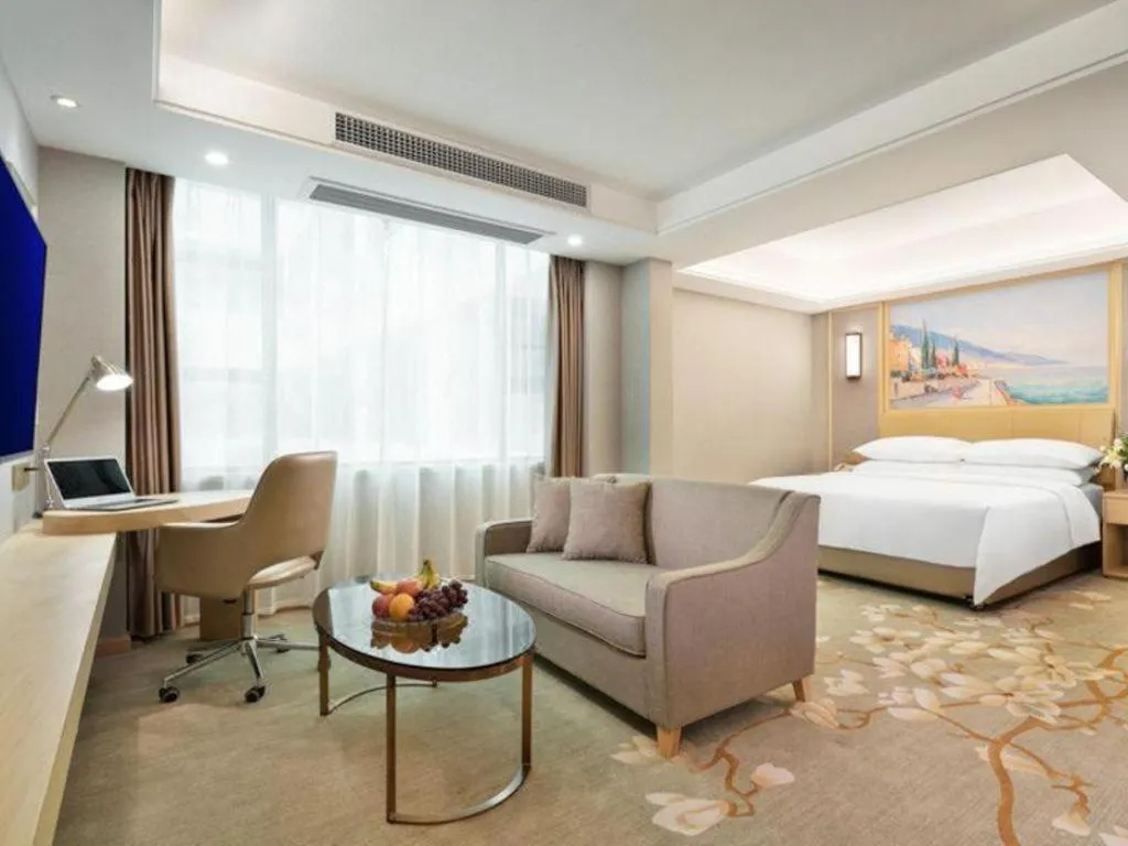 Bed in Vienna Hotel Guangxi Hechi Jinchengjiang Baima Street