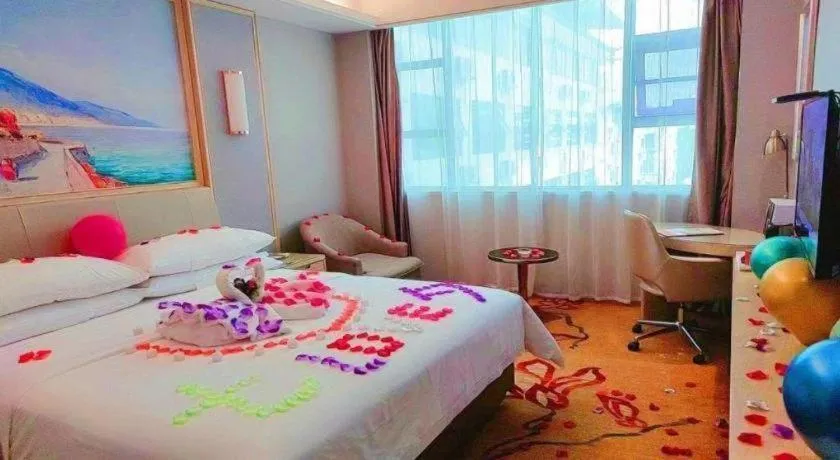 Bed in Vienna Hotel Guangxi Hechi Jinchengjiang Baima Street