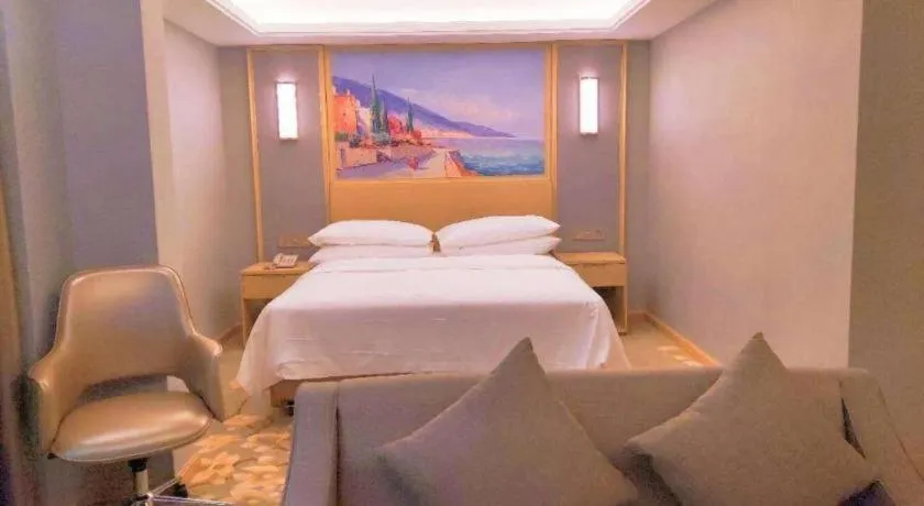 Bed in Vienna Hotel Guangxi Hechi Jinchengjiang Baima Street