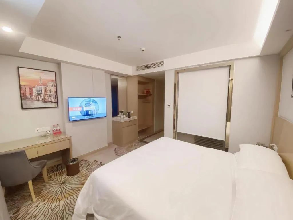 Bed in Vienna Hotel Guangzhou Huadu Financial Center Sunac Amusement Park