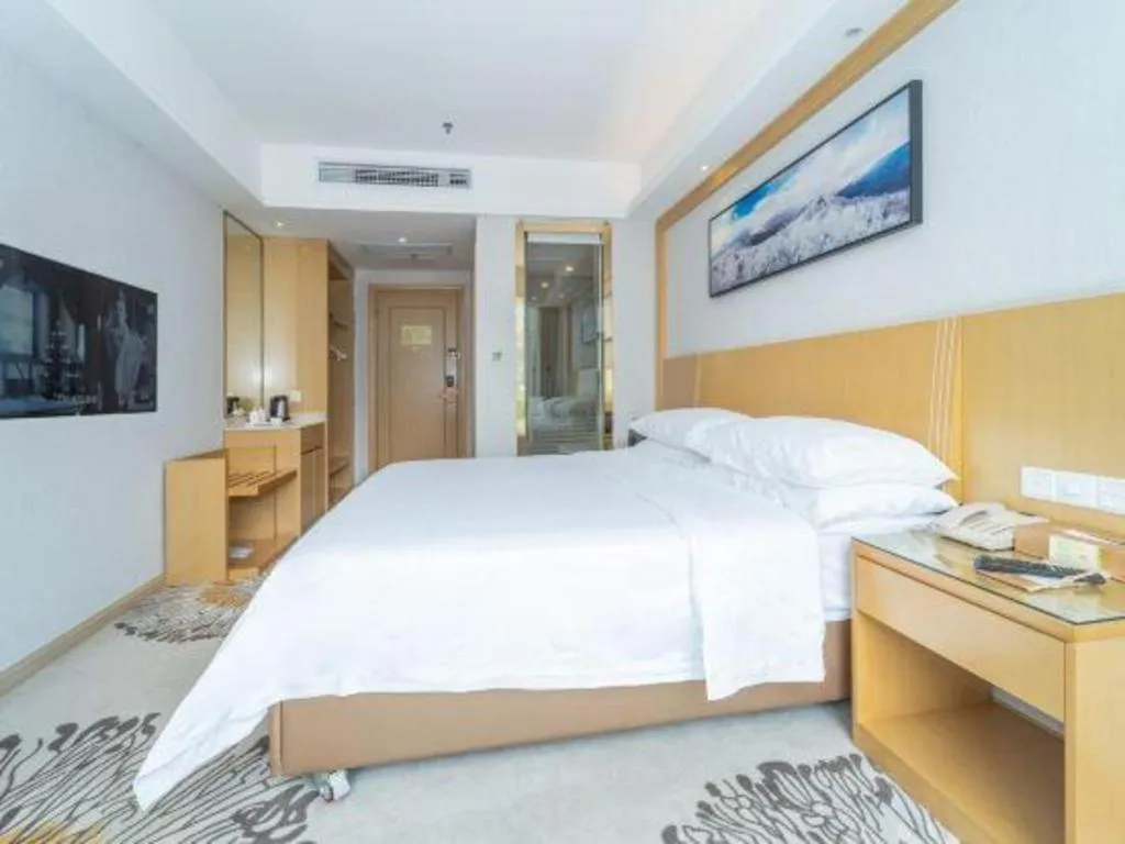 Bed in Vienna Hotel Guangzhou Huadu Financial Center Sunac Amusement Park