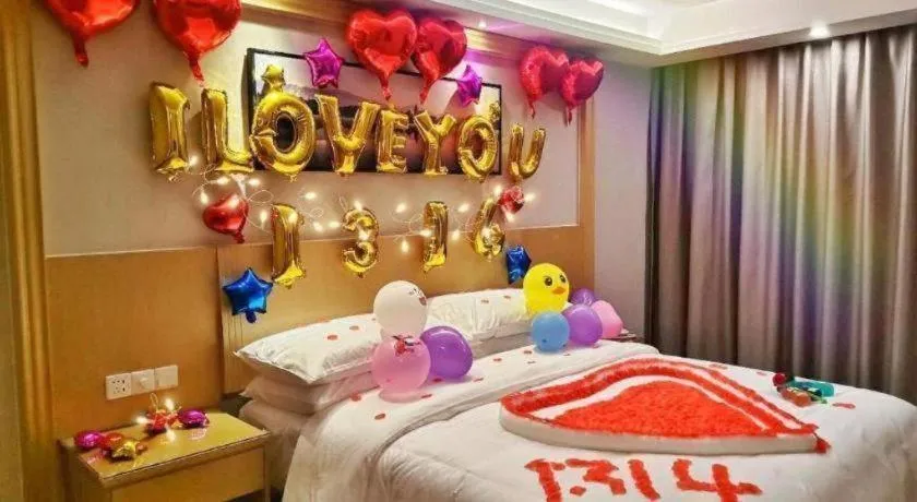 Bed in Vienna Hotel Guangzhou Huadu Financial Center Sunac Amusement Park