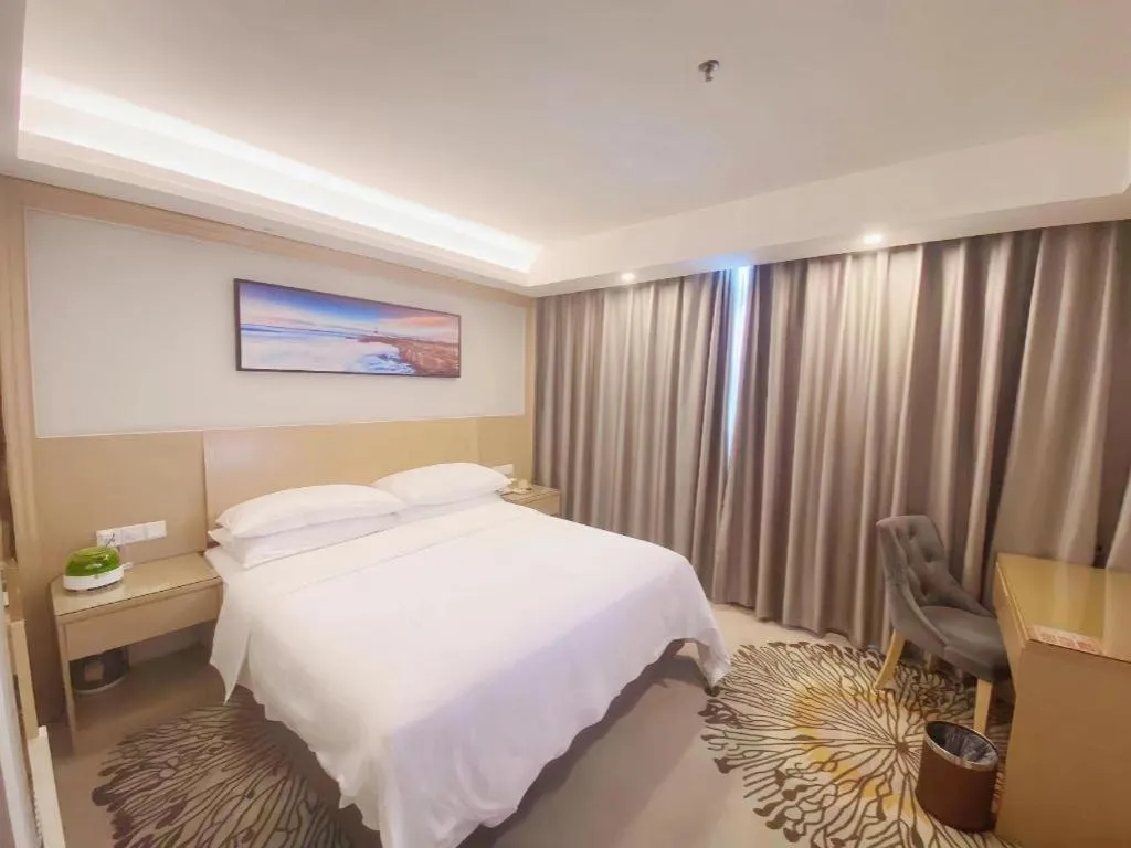 Bed in Vienna Hotel Guangzhou Huadu Financial Center Sunac Amusement Park