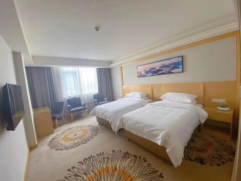 Bed in Vienna Hotel Guangzhou Huadu Financial Center Sunac Amusement Park