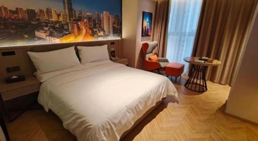 Bed in Vienna Hotel Guangzhou Huadu Financial Center Sunac Amusement Park