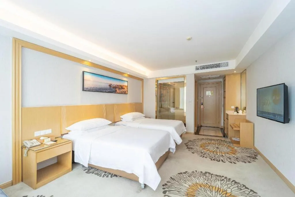 Bed in Vienna Hotel Guangzhou Huadu Financial Center Sunac Amusement Park