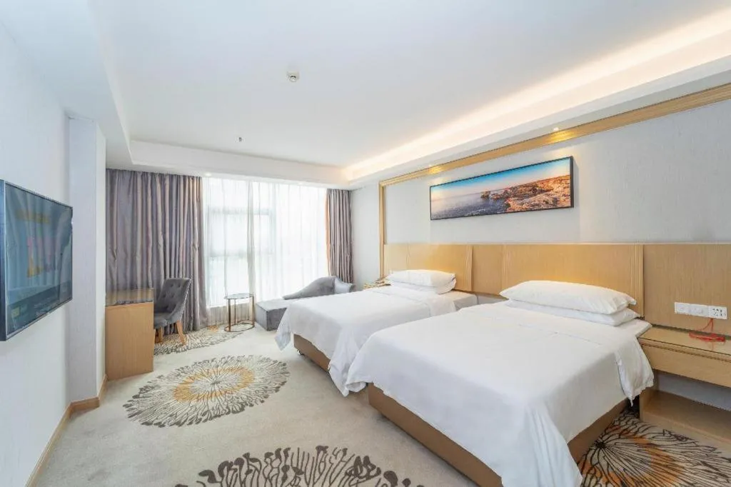 Bed in Vienna Hotel Guangzhou Huadu Financial Center Sunac Amusement Park