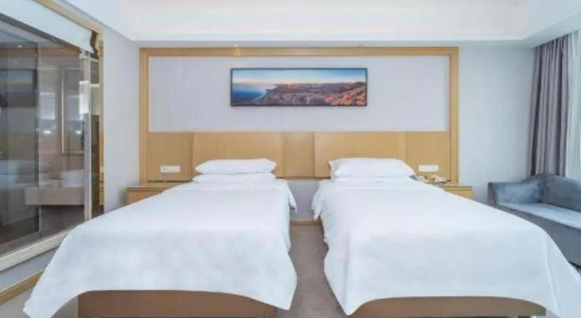 Bed in Vienna Hotel Guangzhou Huadu Financial Center Sunac Amusement Park